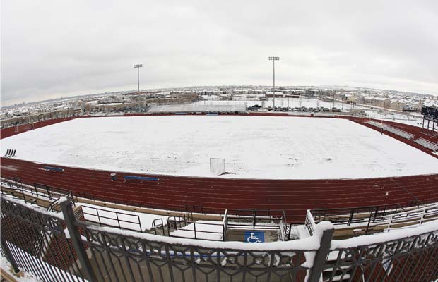 Valor Stadium, which is located on the campus of Valor Christian High School in Highlands Ranch, is snowed over last Thursday.