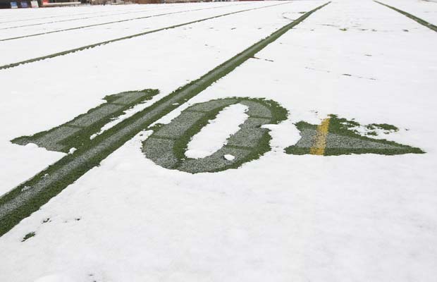 The 10-yard mark is clear of snow in prearation for last Thursday's game at Shea Stadium.