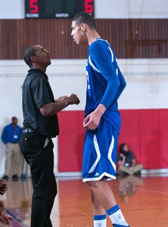 Coley instructs Long during Garinger's final game of the season.