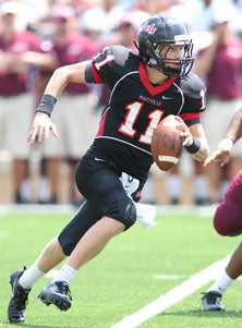 QB Nick Myers accounted for three 
scores as Maryville scored its 
32nd straight victory. 