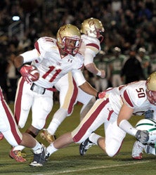 Ishmael Adams does it all for Oaks
Christian.