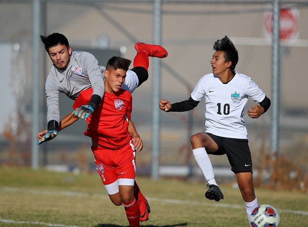 Western (red jersey) battles in a semifinal game on its way to a Nevada 3A boys soccer title.