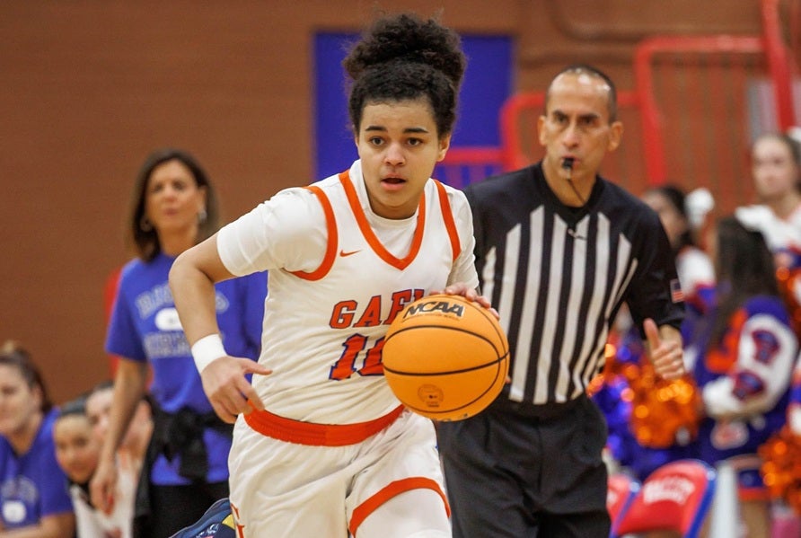 McDonald's All American Aaliah Spaight guided No. 19 Bishop Gorman to its second straight state title Friday night, knocking off Democracy Prep 79-76 in double overtime. Spaight had been averaging nearly 25 points per night heading into the final. (FILE PHOTO: Jenni Webber)