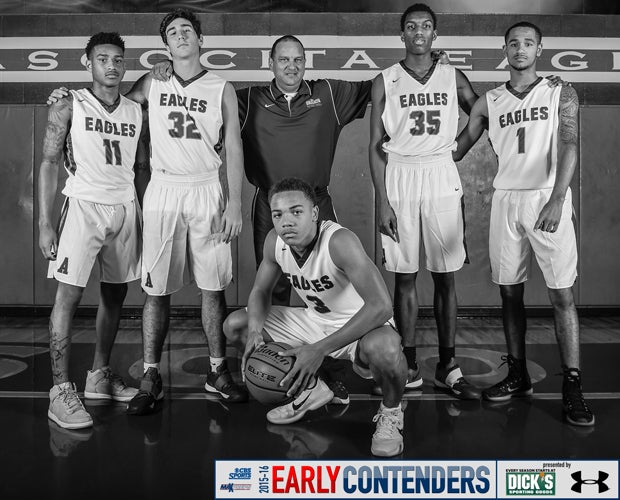 Head coach David Martinez (middle) is surrounded by players Carsen Edwards (kneeing); and (left to right) Greg Shead, Matt Willrodt, Fabian White and Brandon Brooks-Loville.    