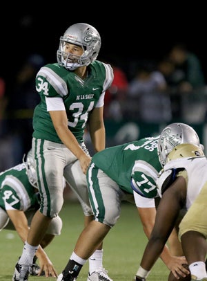 Isaiah Randle (34) will likely be DLS's QB
next season.