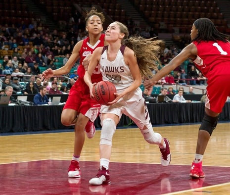 Alyssa Jimenez (center) has Horizon in state title contention, averaging 17.5 points while being an anchor on defense.