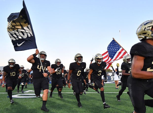 St. John Bosco takes the field in its home opener vs. DeMatha.