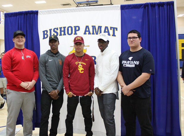Five players from Bishop Amat (La Puente, Calif.) signed letters on Wednesday. From left to right, they are: Matt Brayton (UNLV), Tyler Vaughns (USC), Trevon Sidney (USC), Christian Gaston (Colorado State) and Steven Lopez (Missouri Baptist).