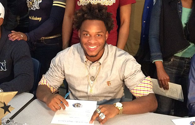 Levonta Taylor of Ocean Lakes (Virginia Beach, Va.) inks his commitment to Florida State.
