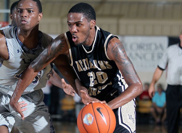 In one of the most inspirational stories of the year, Ja'Quan Newton scored 33 points to lead Neumann-Goretti to the Pennsylvania Class AAA state title the day after his mother lost her battle with cancer.