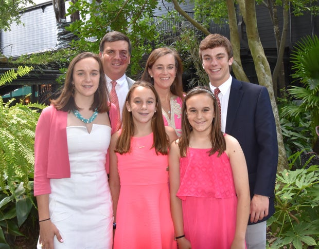 Schmidt with his parents, Justin and Mary, along with his three younger sisters, Conery, Ellie and Anna.