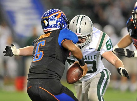 Chris Olinger recorded both De La Salle sacks and epitomized his team's dominating defensive effort.