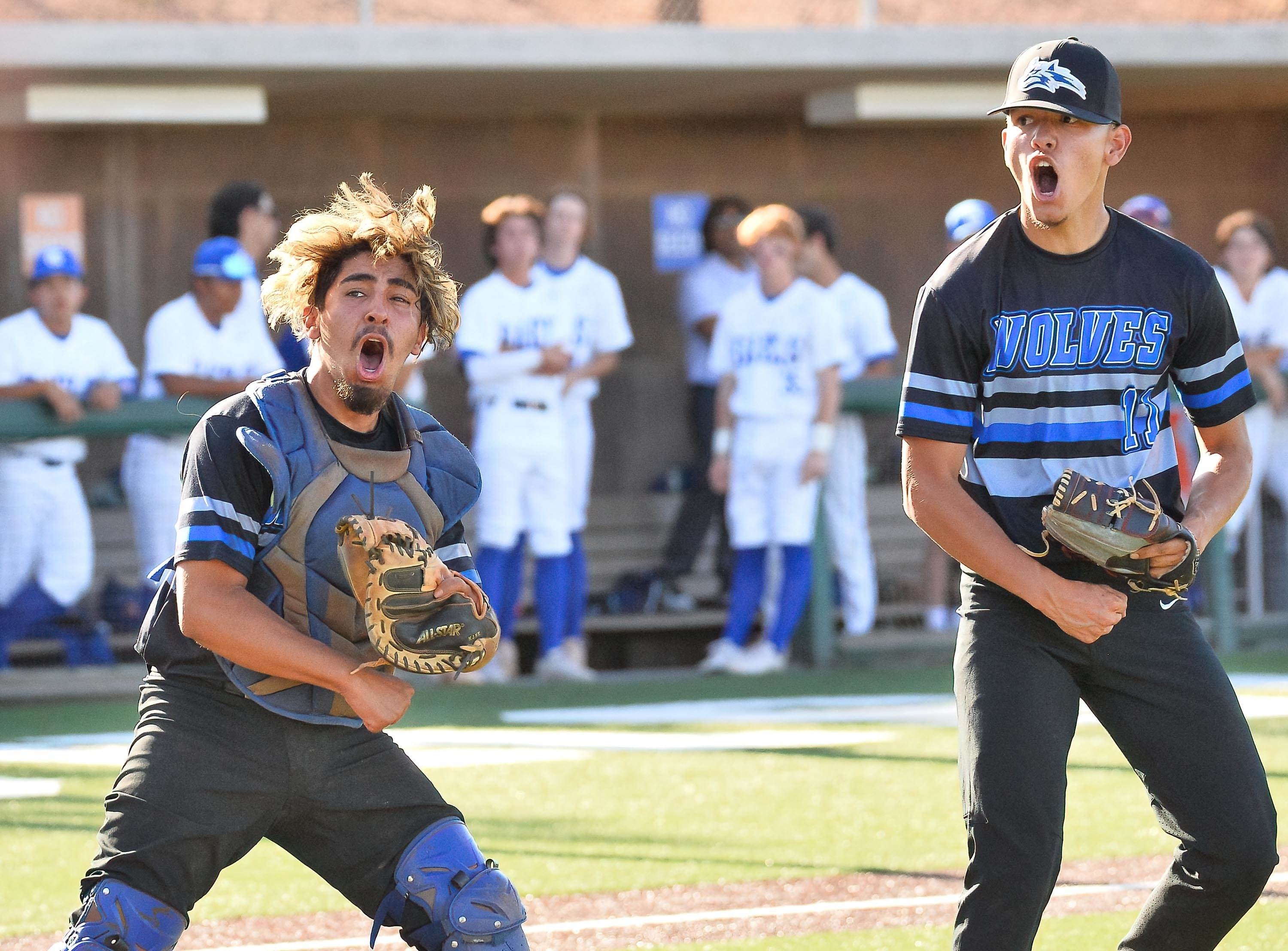 Basic catcher Alex Santiaguin and pitcher Aaron Rubio celebrate the first win of their Nevada 5A series against Bishop Gorman.
