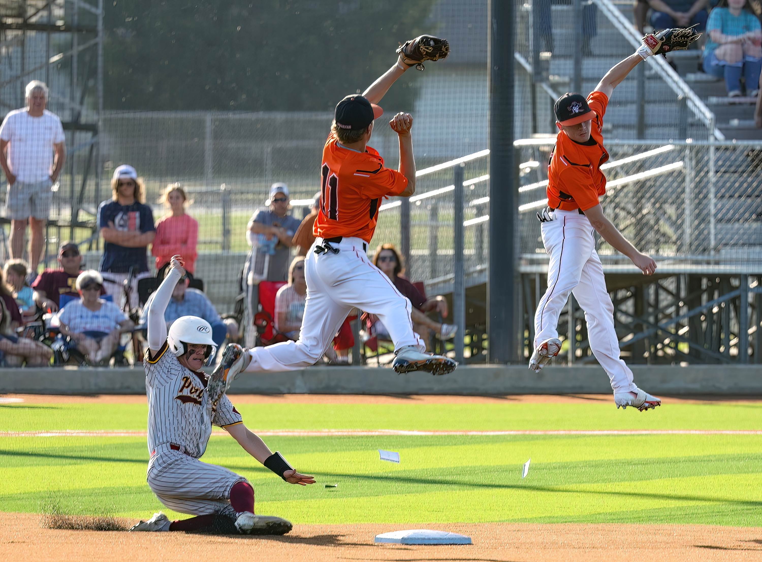 Collinsville's Rylan Newman steals second in an area championship game against Petrolia. Collinsville won the May 12 game 6-0.