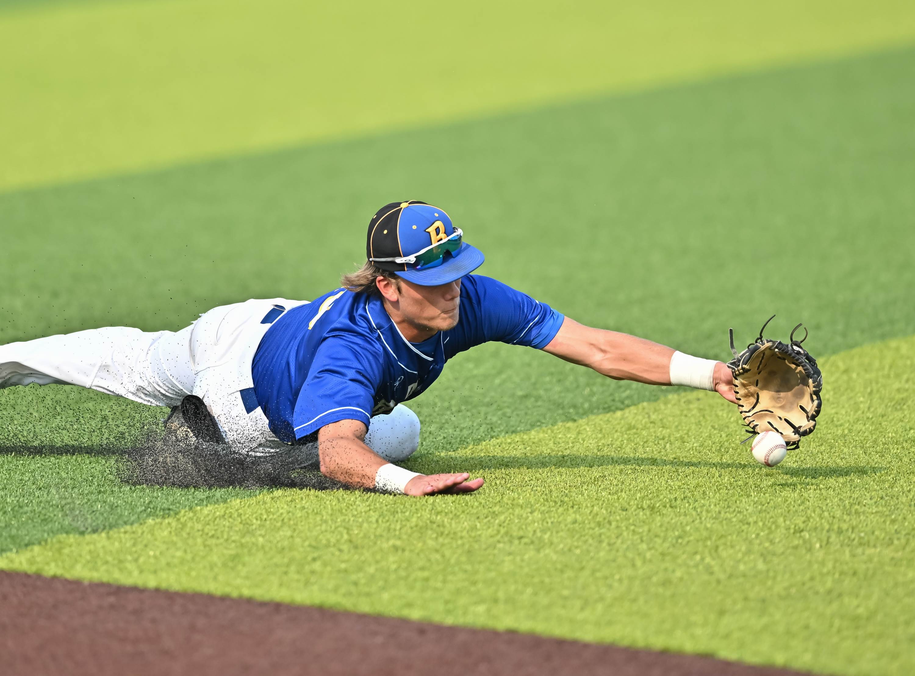 The Blanco second baseman lays out for a ball during the UIL Texas 3A Regional quarterfinal against Marion.