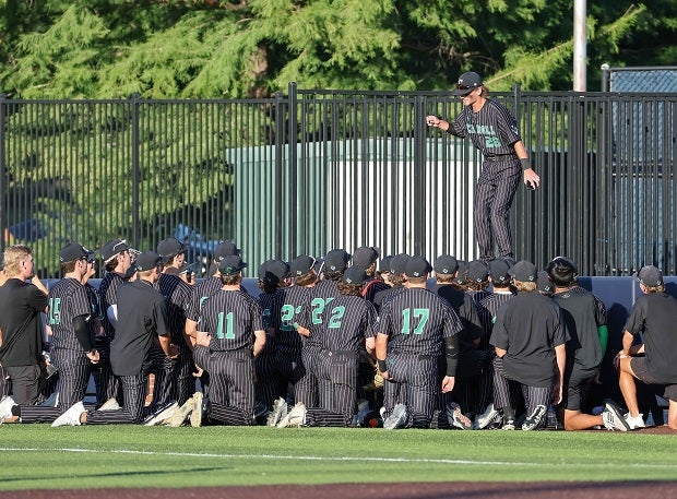 Southlake Carroll’s Colin Coulter leads a pregame pep talk before their UIL 6A Regional semifinal against Coppell.