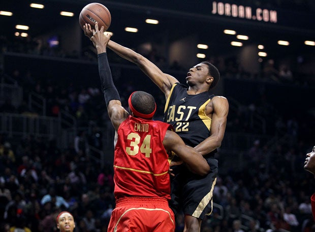 Andrew Wiggins tries to get one past Joel Embiid in a competitive moment between future Kansas teammates at the Jordan Brand Classic.