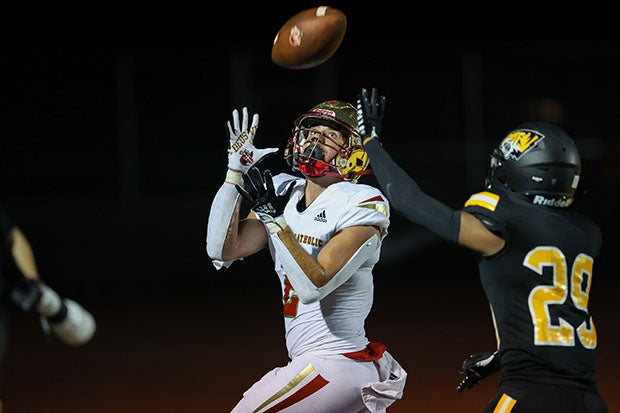 Christian Carti of Bergen Catholic looks to reel in a pass Friday night in a huge win for Bergen Catholic.