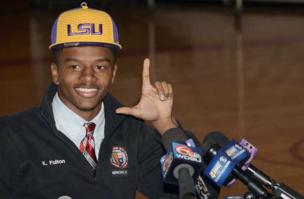 Cornerback Kristian Fulton of Archbishop Rummel (Metairie, La.) looks sharp in tie, custom tailored sweater while flashing the "L" for LSU.