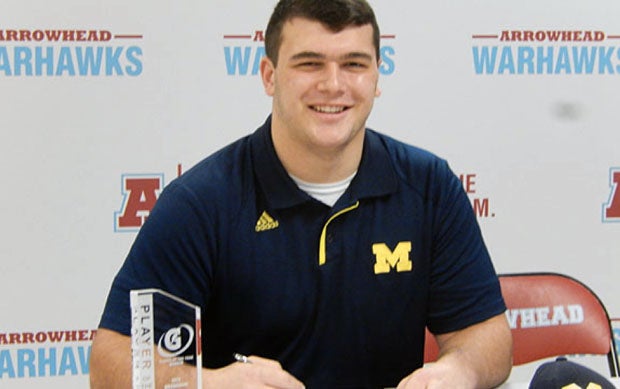 The rugged look and Michigan polo worked nicely for big Ben Bredeson of Arrowhead (Hartland, Wisc.). He pulled it off nicely.