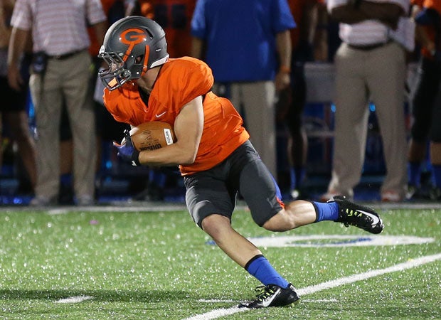 Brandon Gahagan makes a move for his 45-yard touchdown on a punt return.