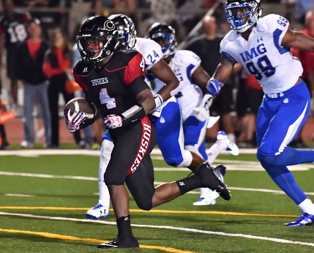 Centennial running back Miles Reed had 162 yards rushing and scored three touchdowns.