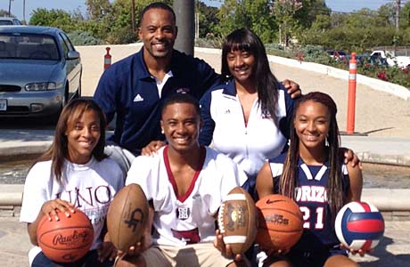 The Carrington family is loaded with athletic talent in San Diego: Darren Sr. (Back left), Vickie (Back right), DiArra (Front left), Darren Jr. (middle) and DiJonai (Front right).
