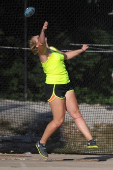Shelbi Vaughan broke her previous
national record twice on Friday.