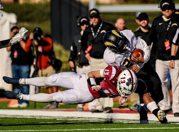 Wilcox's Luther Glenn with a big gain and big hit from Reece Keahey.