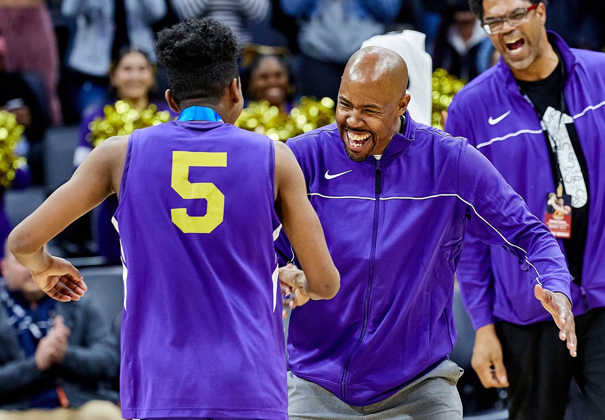 Jason Crowe Jr. celebrates with his head coach and father Jason Crowe Sr. after winning the CIF state championship in March during his freshman season. (Photo: Anthony Brunsman)
