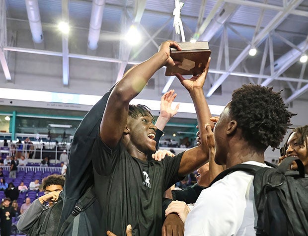 Toure celebrates after winning the City of Palms Classic slam dunk contest with a score of 99 out of 100 in the final round. (PHOTO: Francis Fedor)