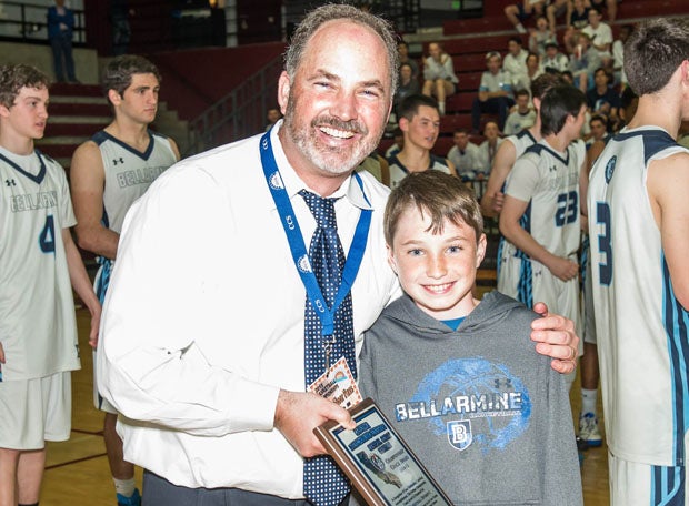 The apple doesn't fall from the tree. Patrick Schneider (left) is also a keen family man, enjoying another championship moment in 2015 with his son Noah.