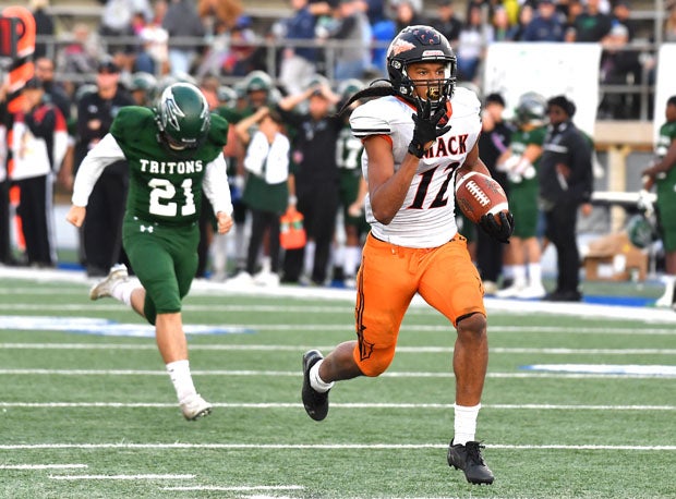 Arrion Hughes rambles home for McClymond's only touchdown late in the fourth quarter. 