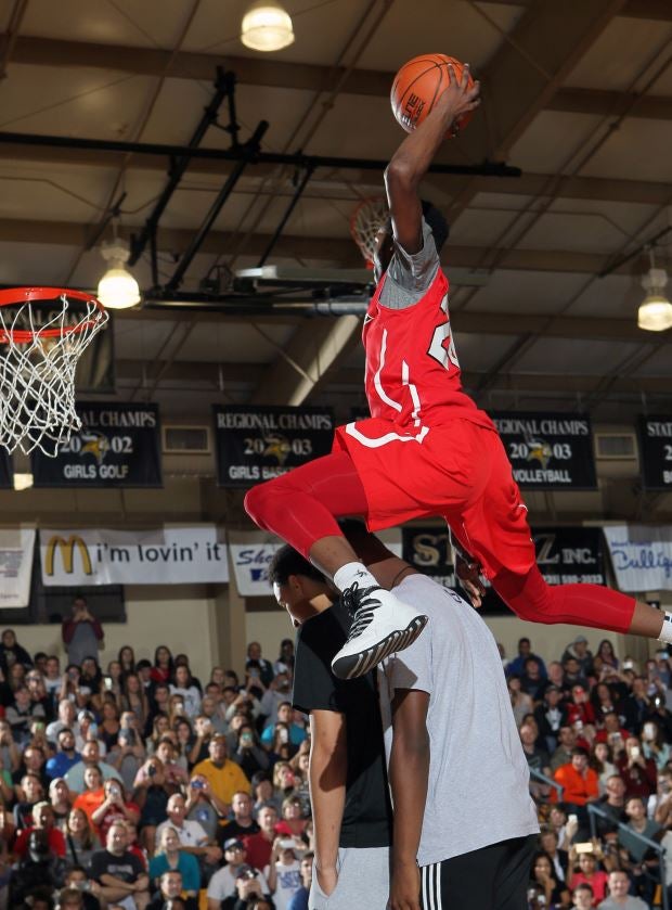 Dunk contest winner Derrick Jones of Archbishop Carroll (Radnor, Pa.) went over fellow City of Palms stars Ben Simmons and Harry Giles for this dunk.