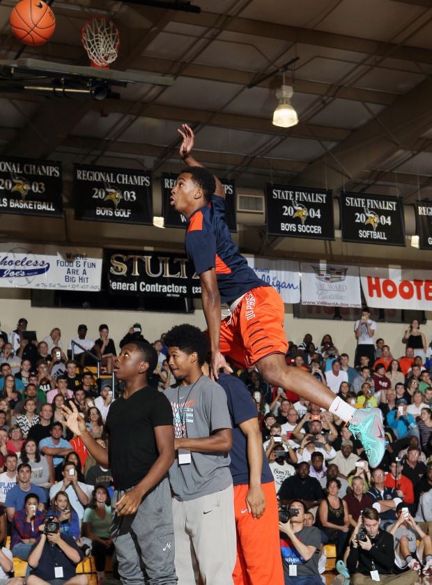 Whitney Young teammates got together for this dunk attempt.