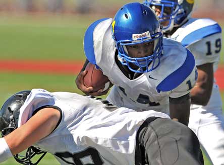 Mossi Johnson took part in three Crenshaw touchdowns Friday: passing, returning an interception and returning a punt.