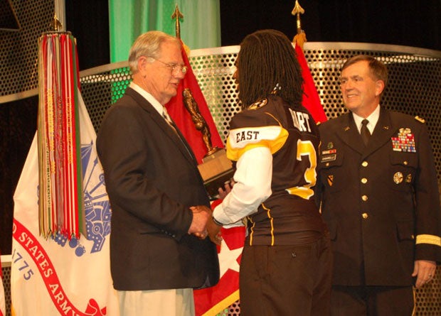 Ken Hall presents a trophy bearing his name each year at the U.S. Army All-American Bowl. He might be passing it along to Derrick Henry this season, the young man on pace to break his hallowed all-time record. This photo shows him giving the trophy to Demetrius Hart in 2011.