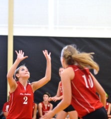 Kylee Kuntz (2) and Emily Palser (10),
Otis volleyball.