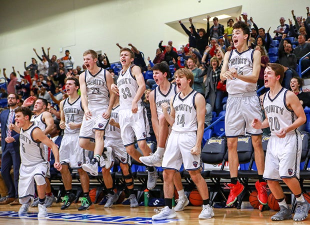 Trinity Christian (Texas) players and fans celebrate a go-ahead basket in the large school final of the Fibermax Caprock Classic.