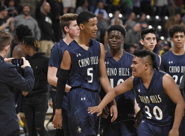 The Chino Hills bench appreciate the big effort from Andre Ball (5) after he scored 32 points in the Southern California finals. 