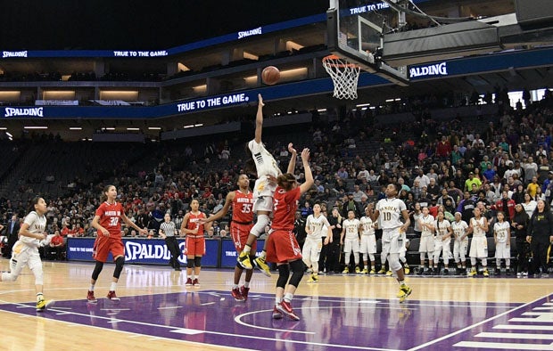 Julia Blackshell-Fair with her game-winning basket following steal at midcourt. 