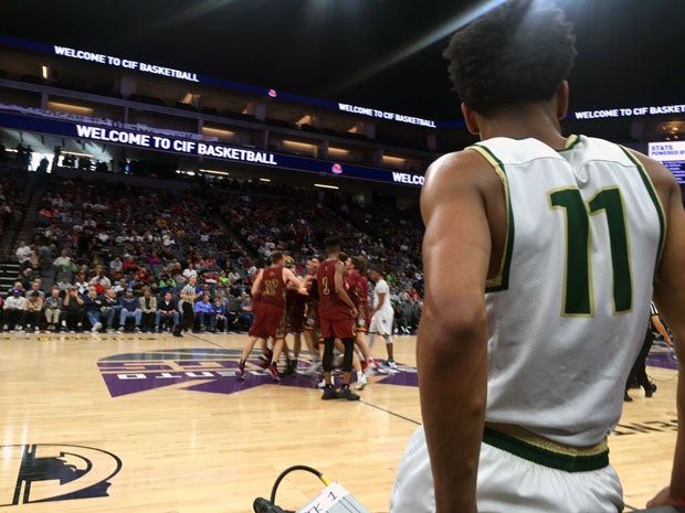 Damari Milstead looks on at the Esperanza celebration after concluding brilliant high school career. 