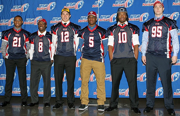 Big 10 recruits pose for a photo at the USA Football Signing Day ceremony at AT&T Stadium in Dallas.