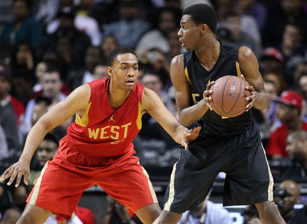 Jabari Parker (left) and Andrew Wiggins battled each other three times in the spring of 2013, including this meeting at the Jordan Brand Classic.