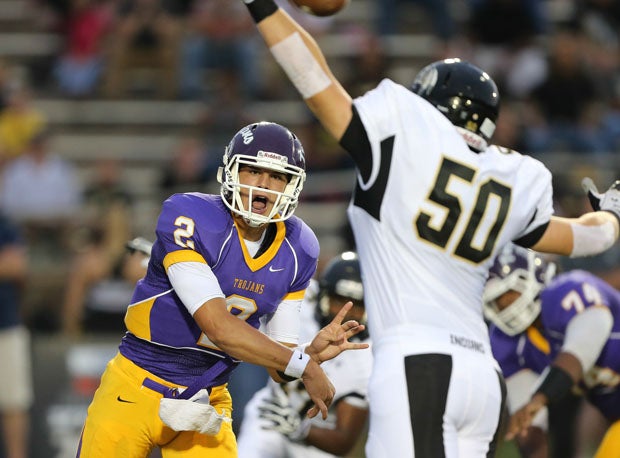 Northwestern quarterback Mason Rudolph accounted for five touchdowns, including a TD pass in overtime lifting his team to a wild 42-35 win over visiting Byrnes.
