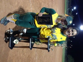 Statman, left, poses with the DesertMountain Tournament title trophy alongsideASU signee Margaret Stahm.