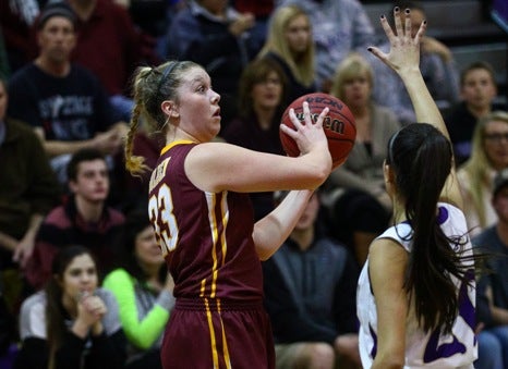 The Golden girls basketball team, led by University of Ohio signee Abby Garnett, left, is one of the favorites in Class 4A this season. The Demons are part of a powerhouse Jeffco League that is perhaps the state's best. 