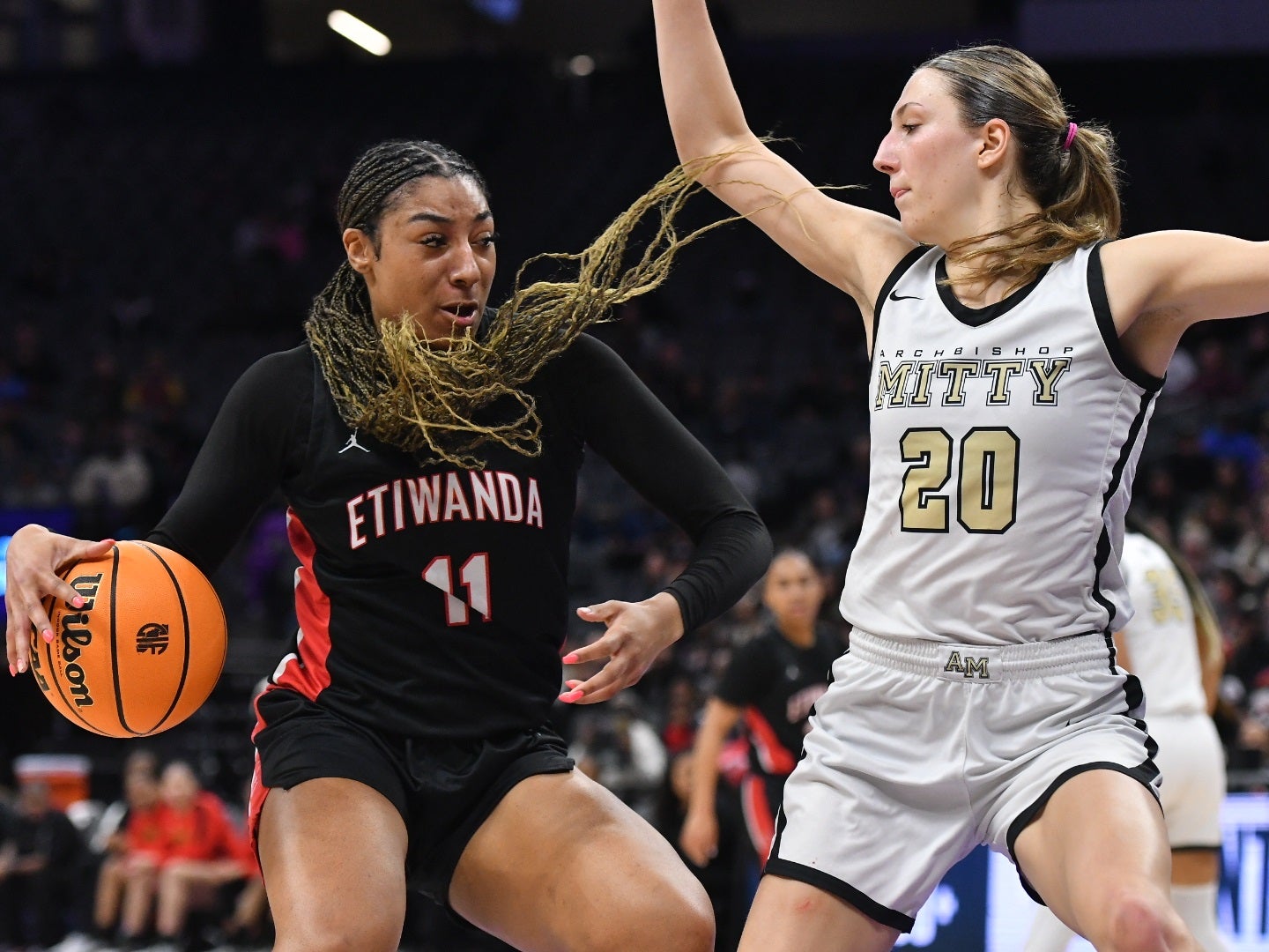 Etiwanda's Kennedy Smith battles Archbishop Mitty's McKenna Woliczko on Saturday in the CIF Open Division finals. Etiwanda won its second straight state title with a 60-48 victory over Mitty on Saturday. (Photo: David Steutel)