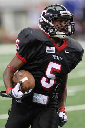 Trinity's Bobby Brown scores one of his two TDs.