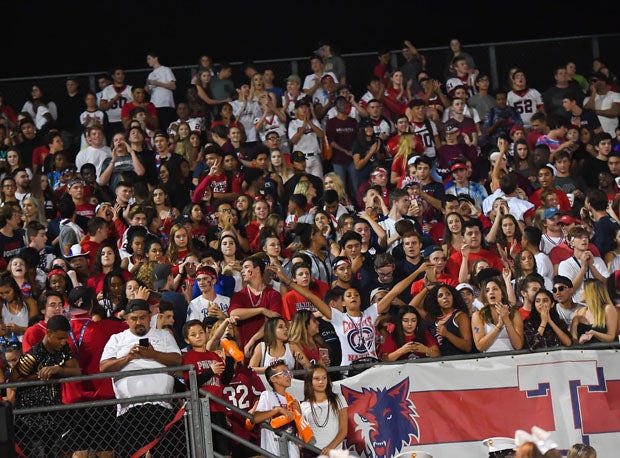 The fans were jammed in and around Centennial's home stadium. 